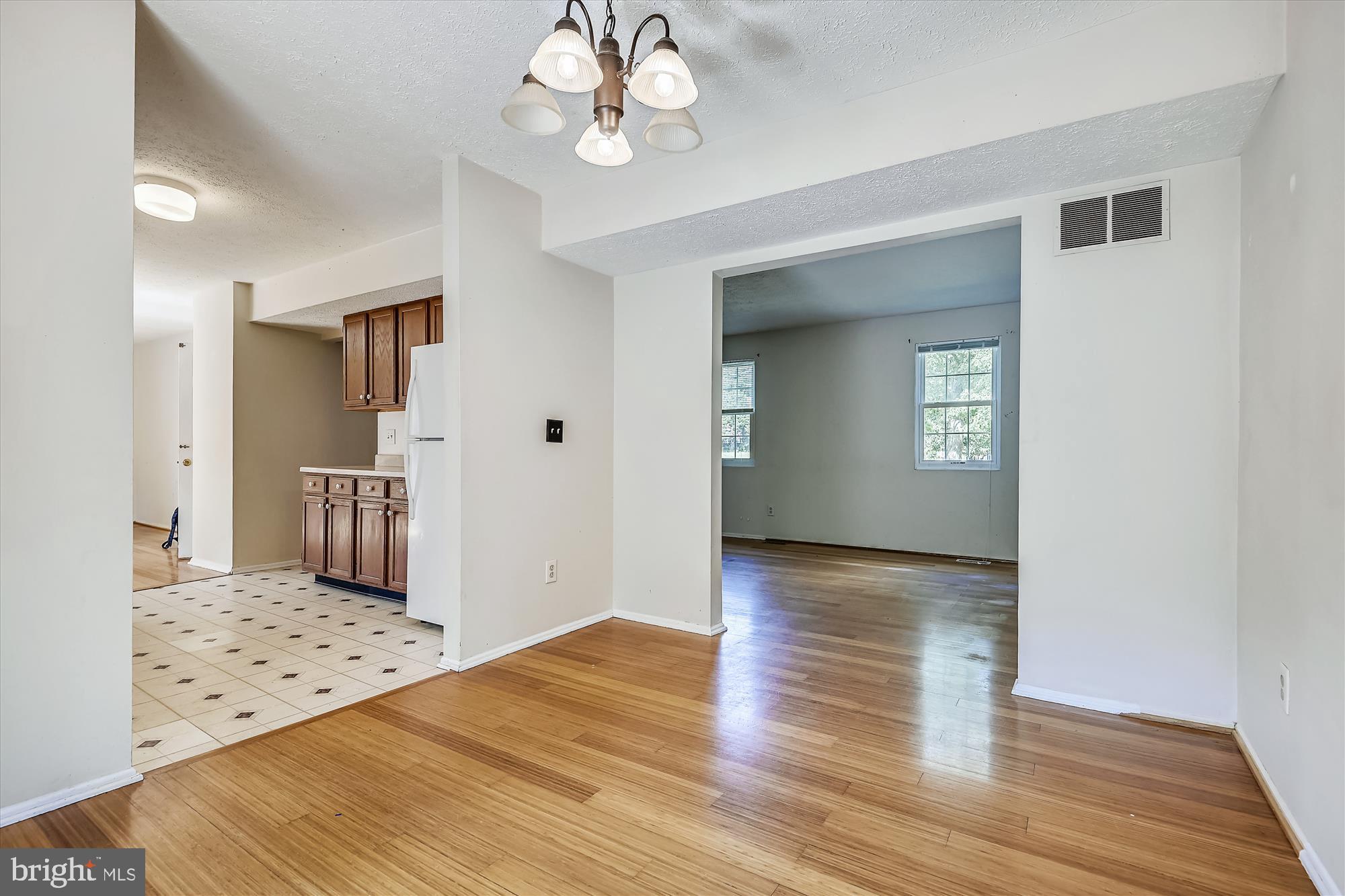 1210 Hunter Road Pasadena, MD 21122 - Photo 14 of 42 Dining room also features hardwood floors