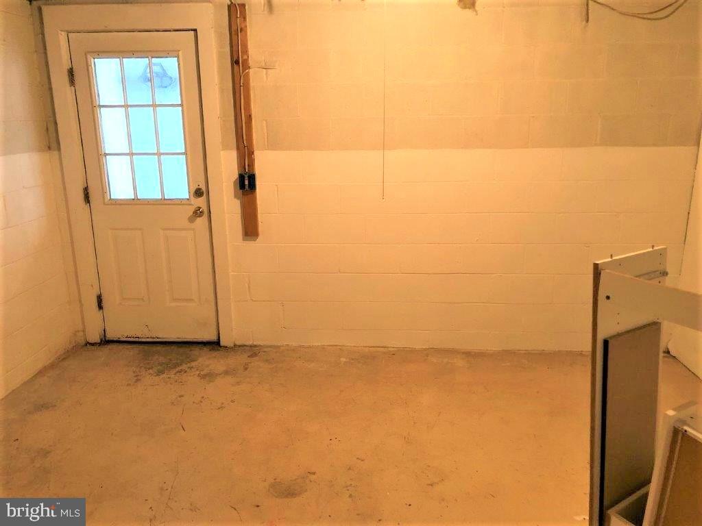 1210 Hunter Road Pasadena, MD 21122 - Photo 35 of 42 Door to Basement Areaway