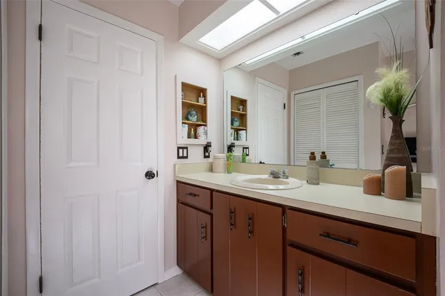 a view of a house with a tree