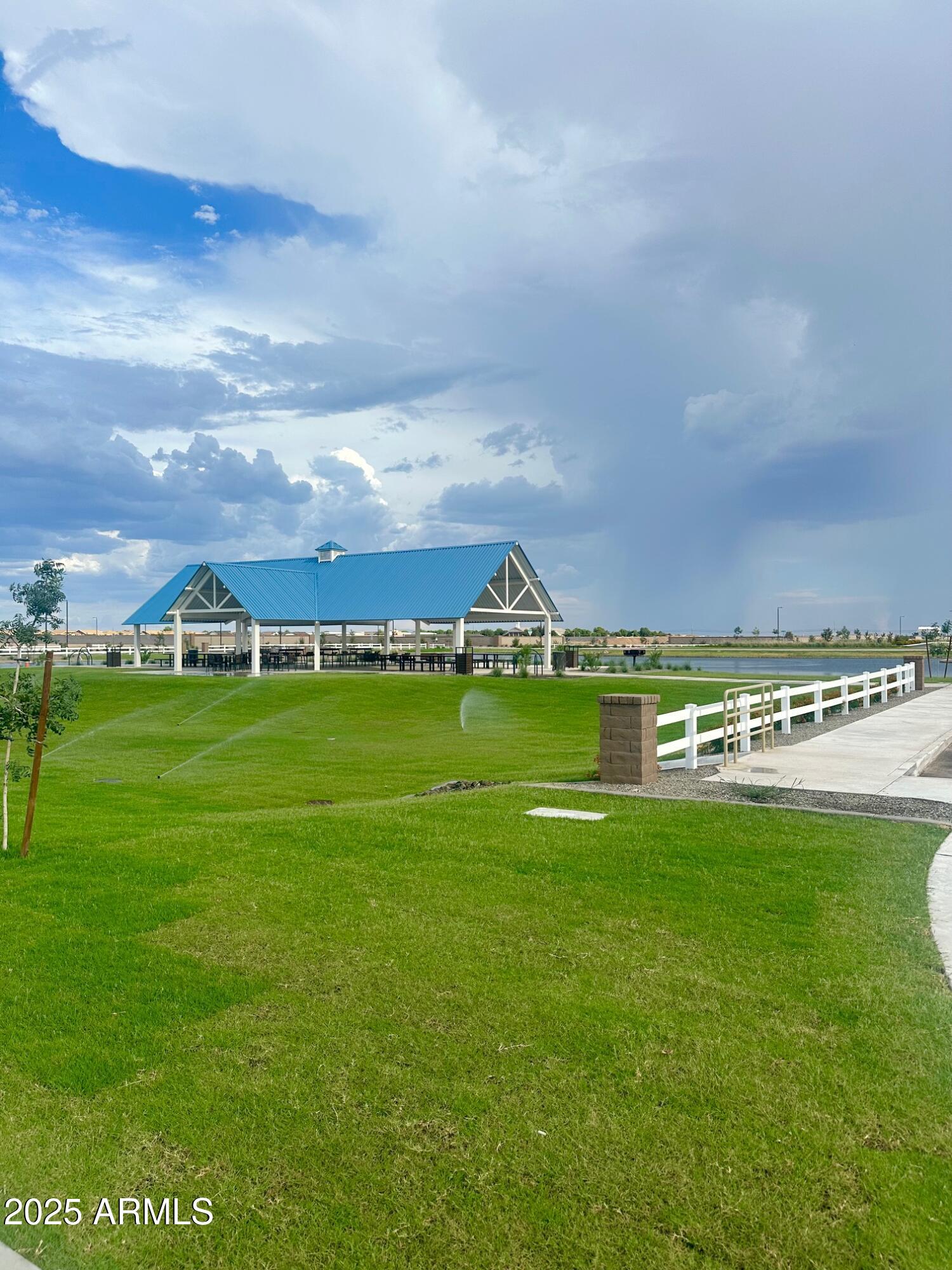 2110 Night Rider Road San Tan Valley, AZ 85140 - Photo 5 of 14 a view of building with outdoor space and seating