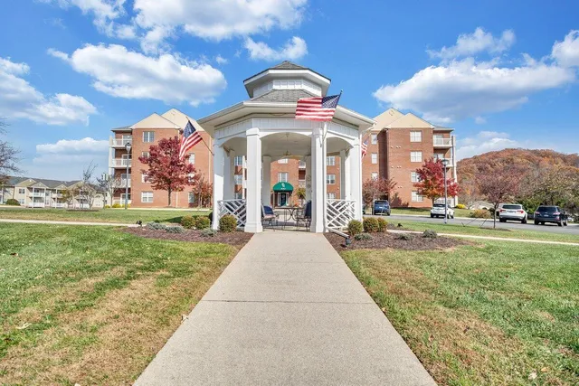 a view of a building with a yard