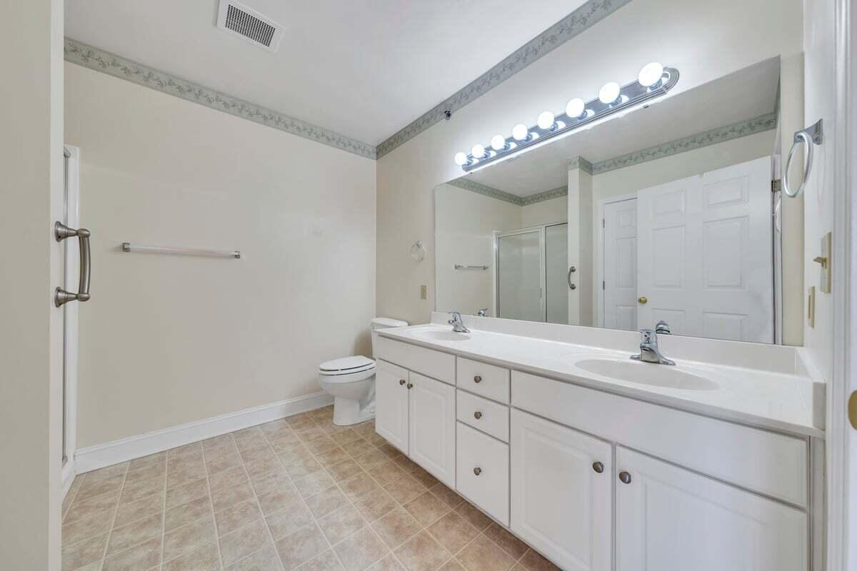 4444 Pheasant Ridge Road, Unit 207 Roanoke, VA 24014 - Photo 24 of 49 a spacious bathroom with a double vanity sink mirror and toilet
