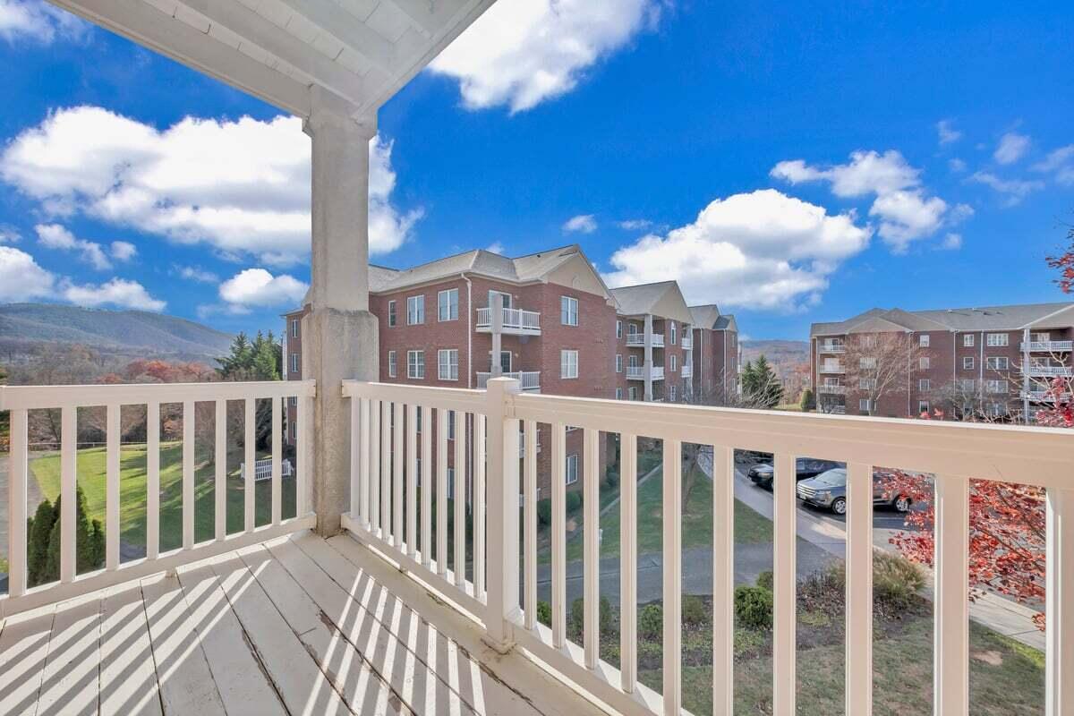 4444 Pheasant Ridge Road, Unit 207 Roanoke, VA 24014 - Photo 38 of 49 a view of a building from a balcony