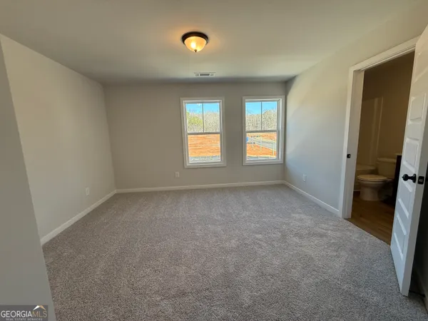 an empty room with windows