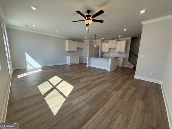 a living room with furniture and a table