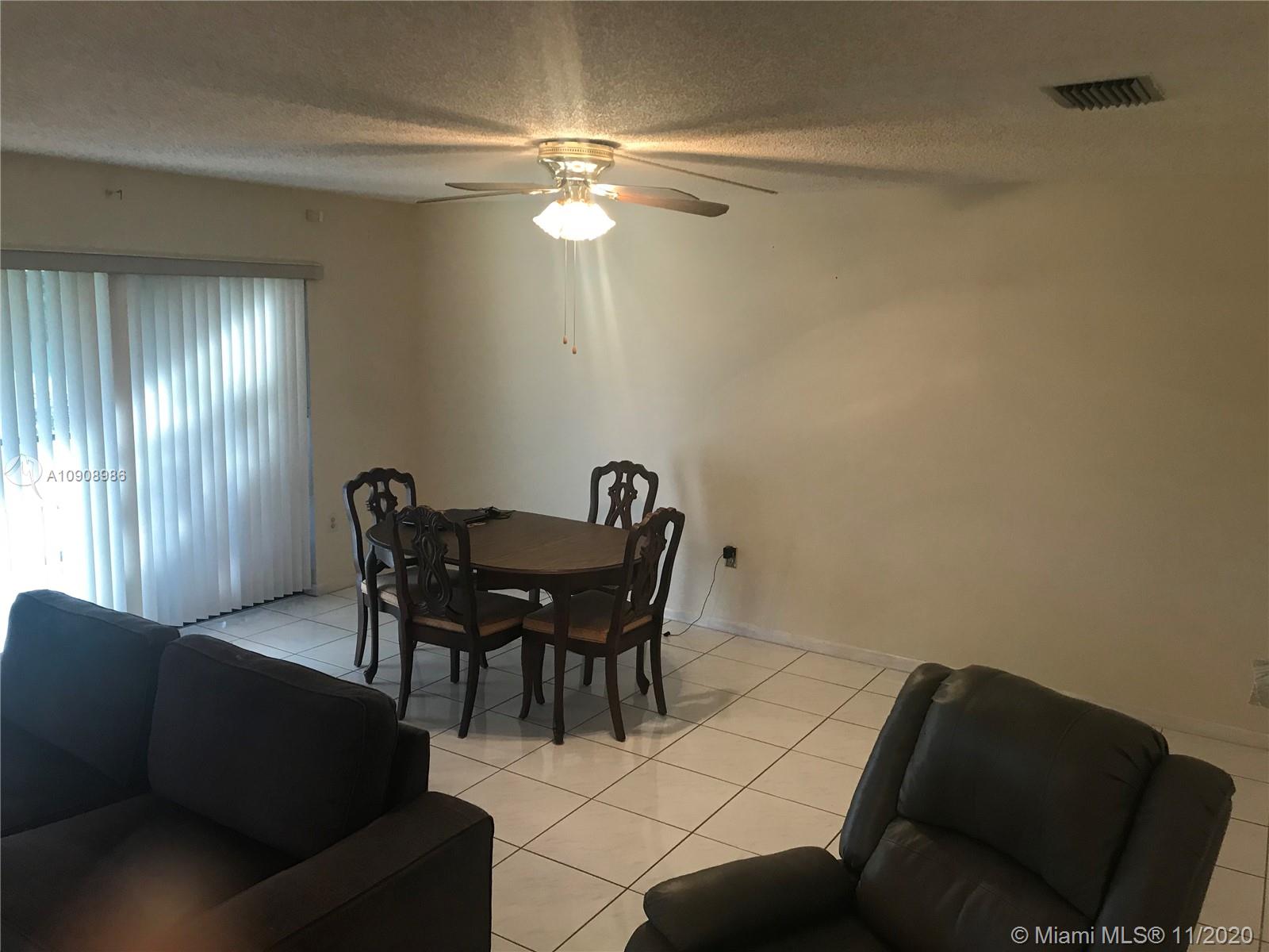 5465 Gate Lake Road, Unit 5465 Tamarac, FL 33319 - Photo 2 of 18