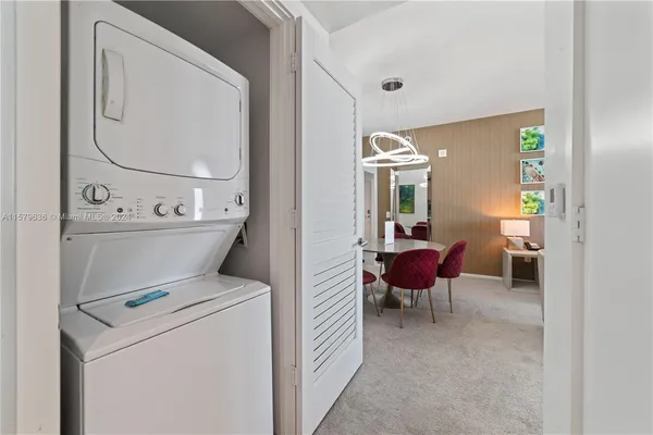 a view of living room and utility room
