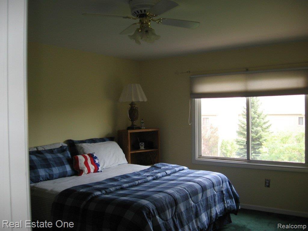 2195 Crystal Drive, Unit 17 Rochester, MI 48309 - Photo 9 of 13 Master Bedroom