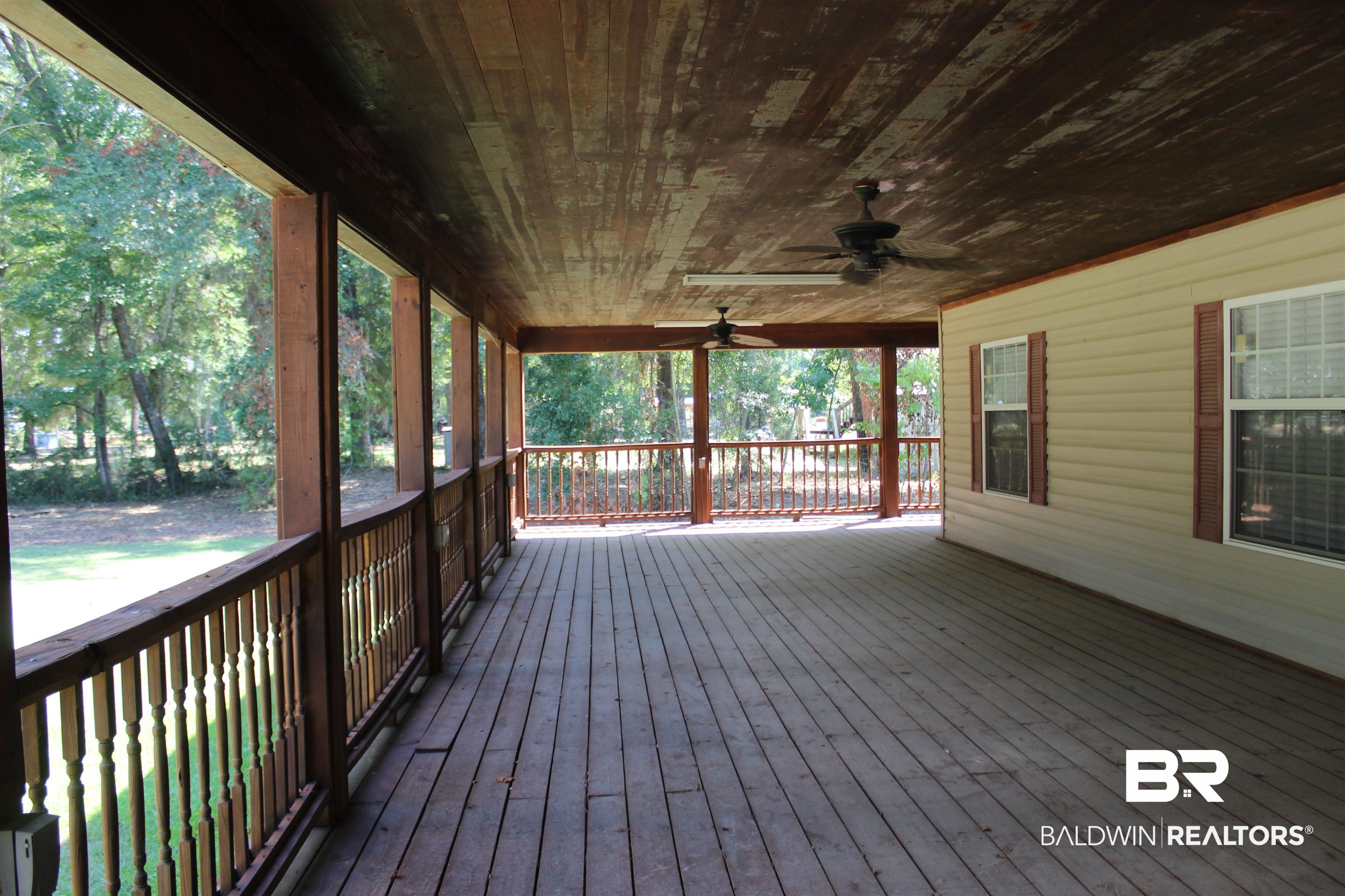 7258 Henderson Road Lowndesboro, AL 36752 - Photo 7 of 22 Wooden terrace featuring ceiling fan