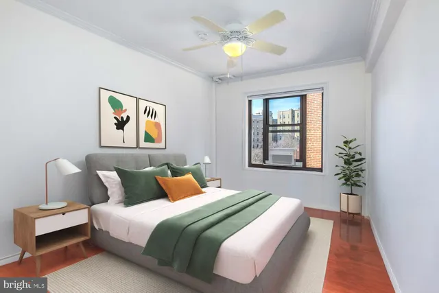 a bedroom with bed and a window