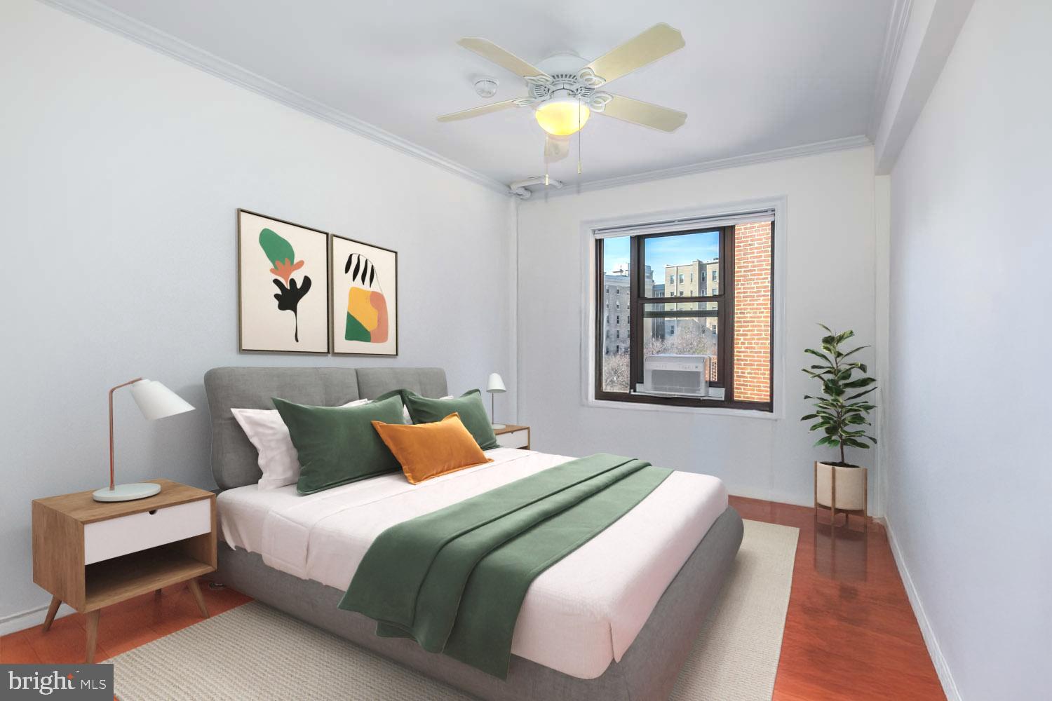 2100 19th Street Northwest, Unit 701 Washington, DC 20009 - Photo 12 of 24 a bedroom with bed and a window