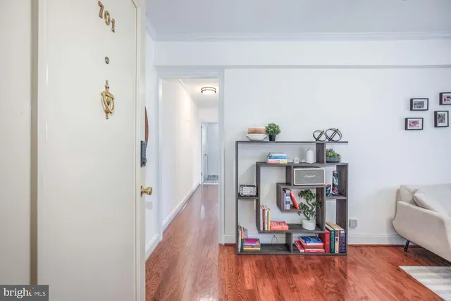 a room with furniture and wooden floor
