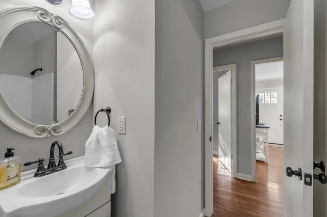 a bathroom with a sink and a mirror