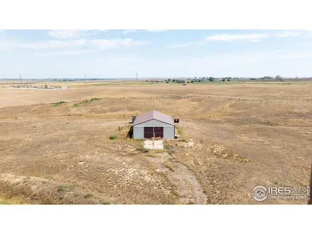 a black and white photo of a beach
