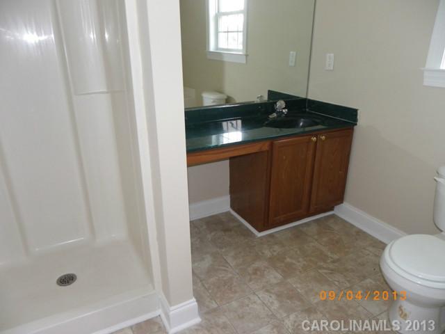 2210 Cedar Road York, SC 29745 - Photo 6 of 11 a bathroom with a sink and a mirror
