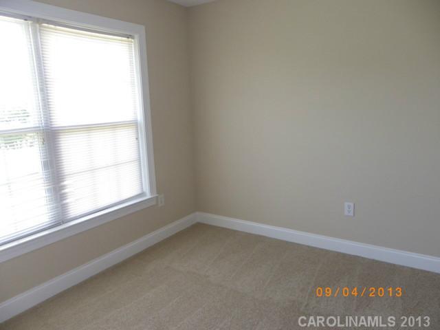 2210 Cedar Road York, SC 29745 - Photo 9 of 11 an empty room with a window