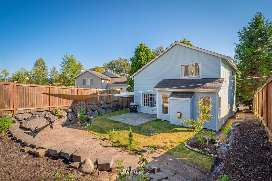 18469 Rainier View Road Southeast Monroe, WA 98272 - Photo 22 of 22 a view of a house with backyard