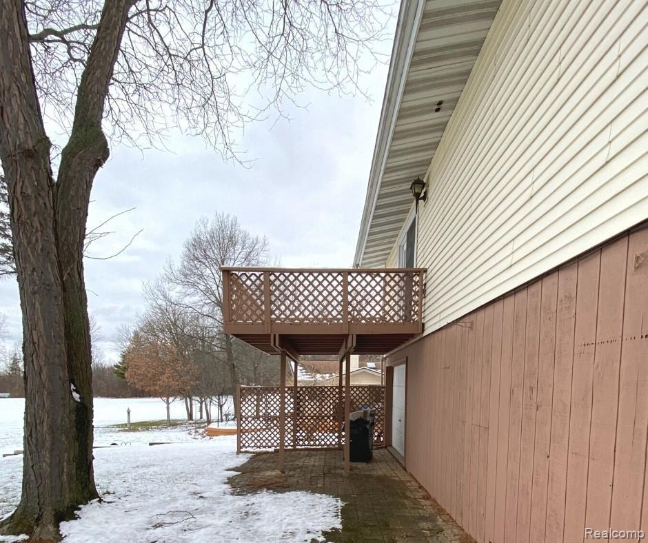 3356 East Pierson Road Flint, MI 48506 - Photo 7 of 17 Private deck off of Master Suite. Rear Garage Door