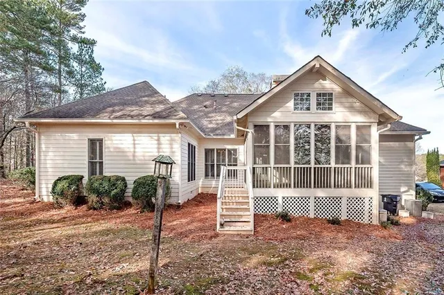 a front view of a building with large windows