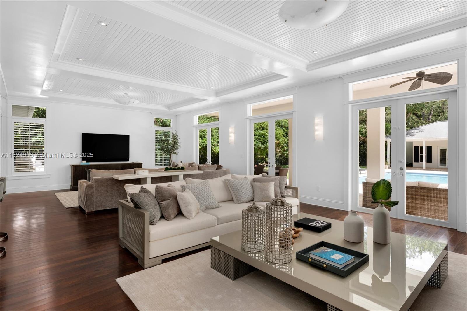 7415 Southwest 49th Place Miami, FL 33143 - Photo 12 of 60 a living room with furniture and a flat screen tv