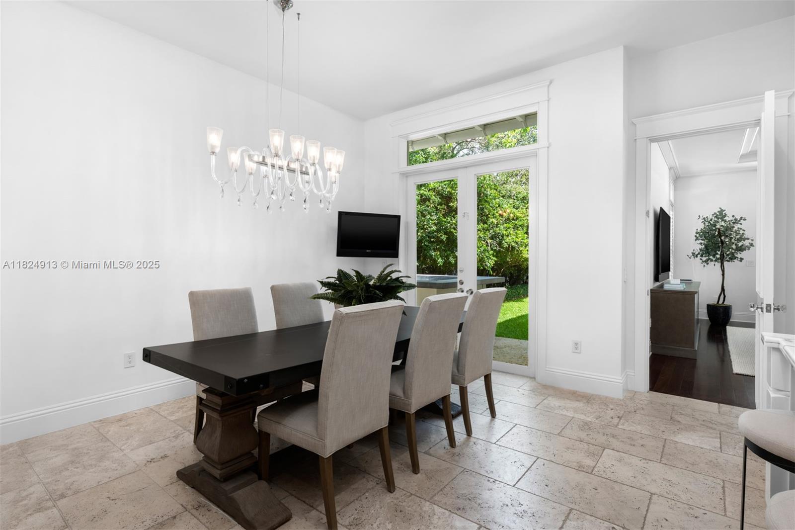 7415 Southwest 49th Place Miami, FL 33143 - Photo 20 of 60 a view of a dining room with furniture window and outside view