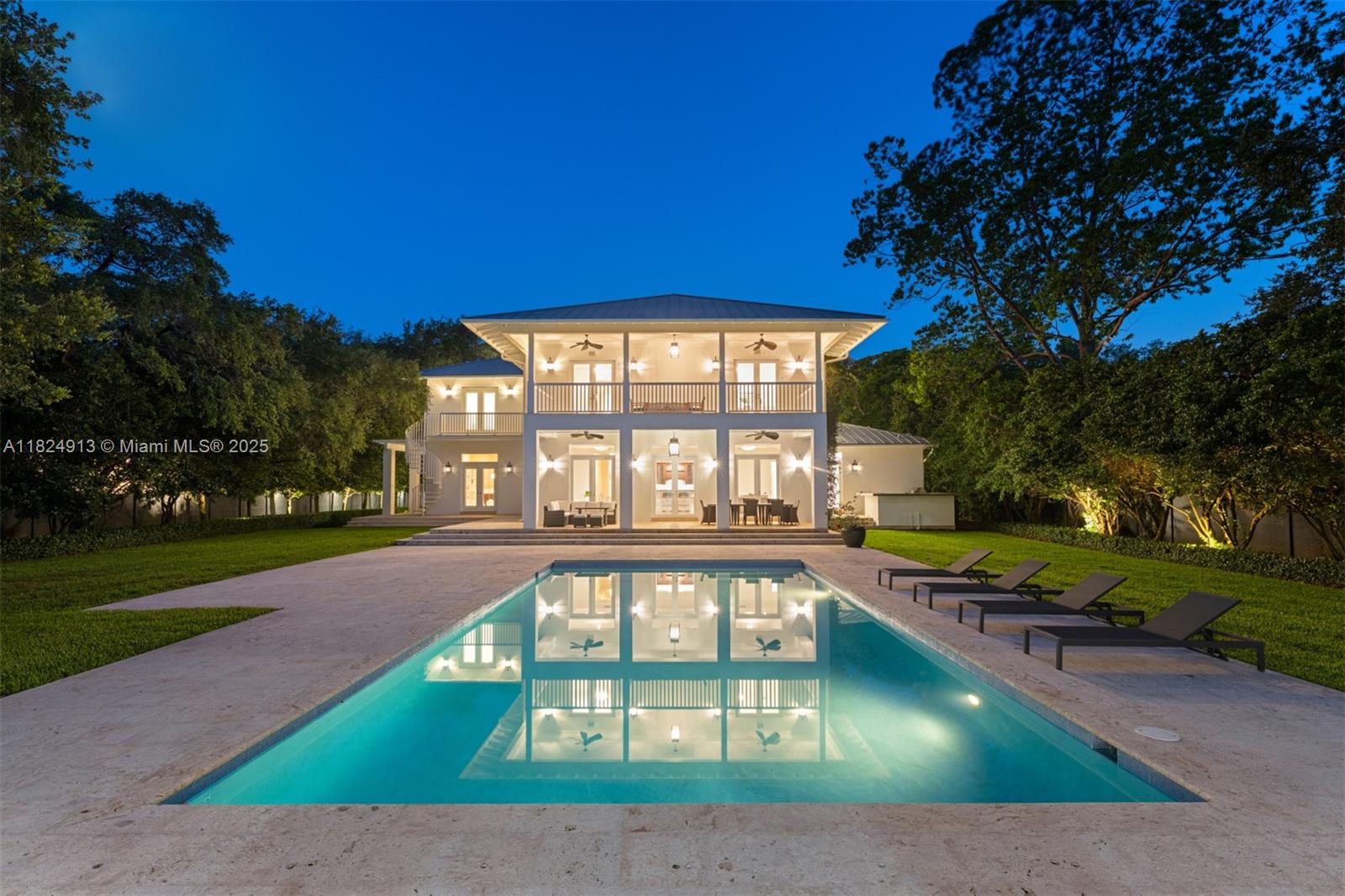 7415 Southwest 49th Place Miami, FL 33143 - Photo 56 of 60 a view of a swimming pool with a yard