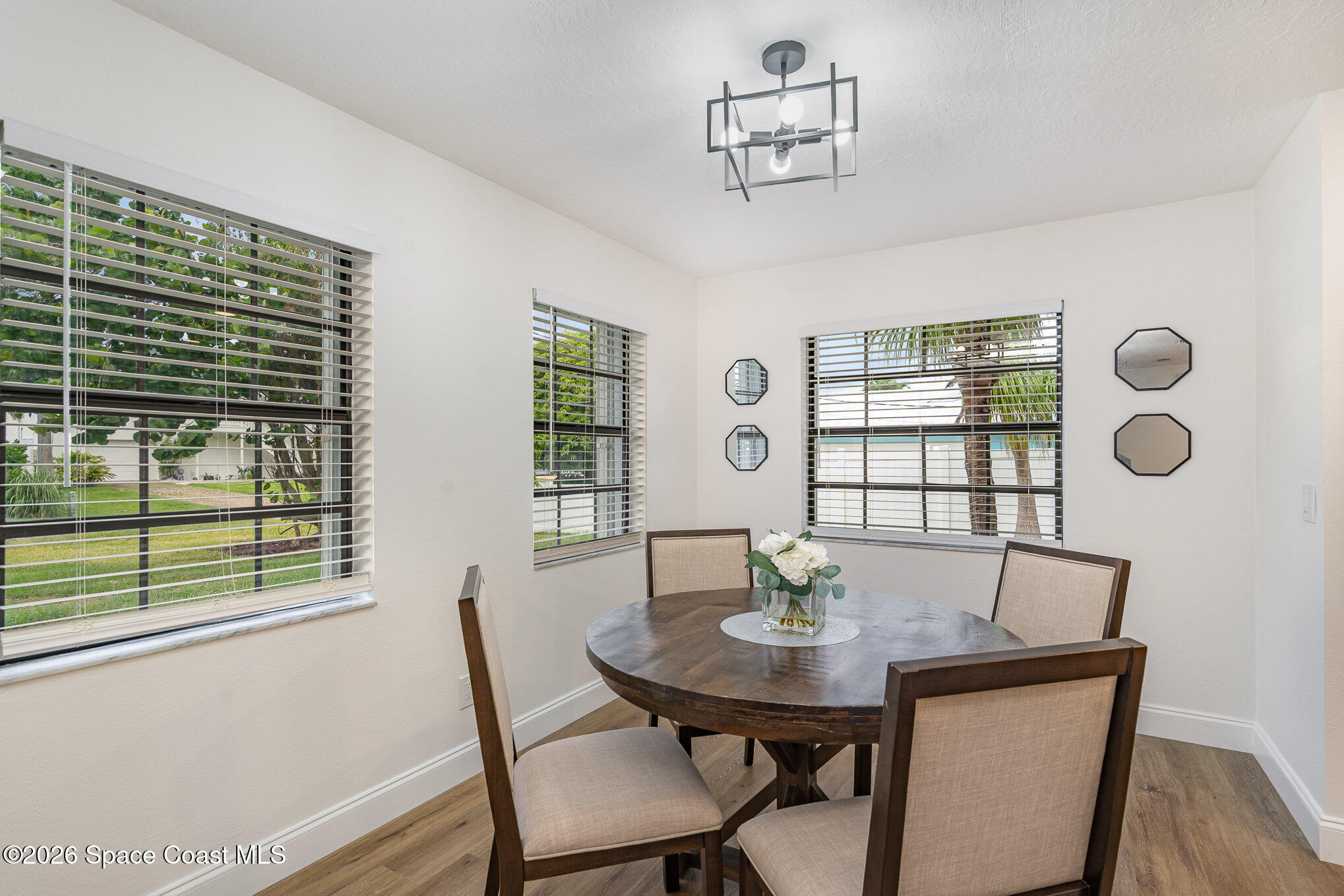 362 Nikomas Way Melbourne Beach, FL 32951 - Photo 10 of 32 a view of a dining room with furniture and window