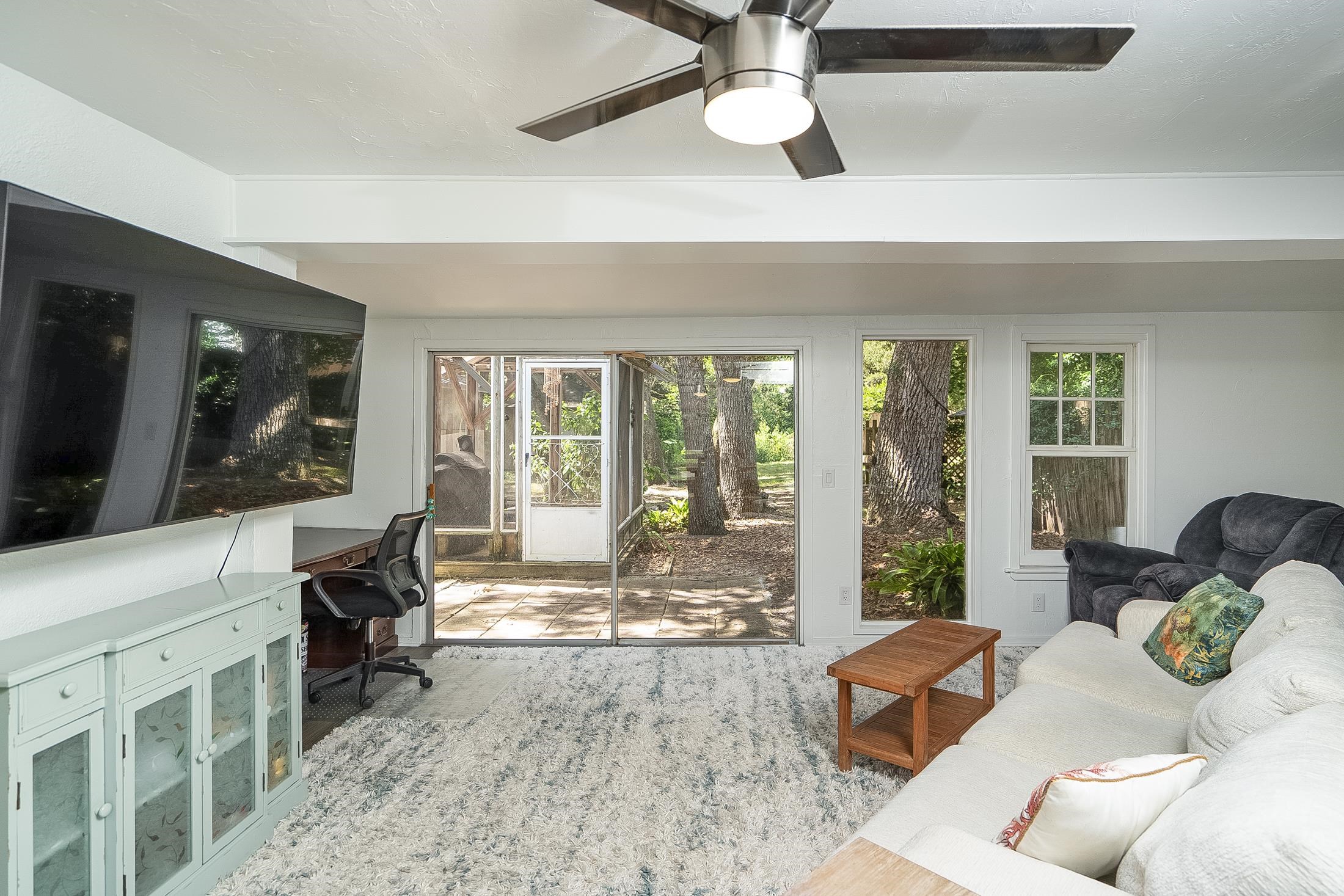 490 Pyrus Street St. Augustine, FL 32080 - Photo 11 of 35 a living room with furniture and a large window