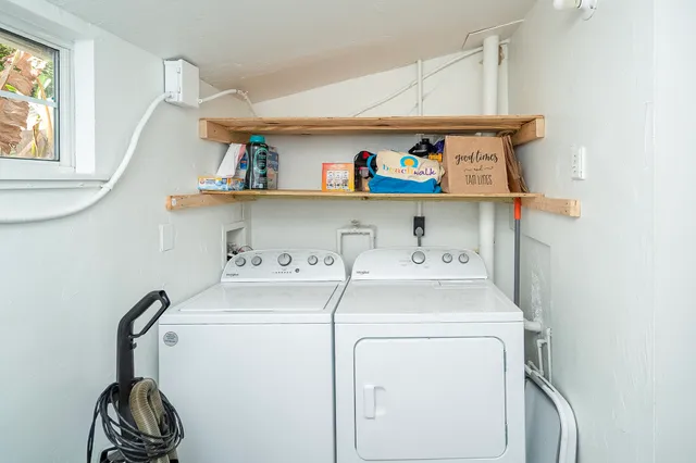 a bedroom with a bed and a cabinets