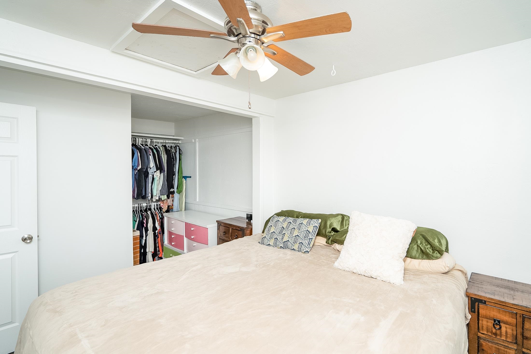 490 Pyrus Street St. Augustine, FL 32080 - Photo 26 of 35 a bed room with a bed and a ceiling fan