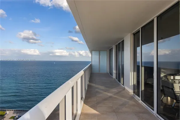 a view of balcony with ocean view