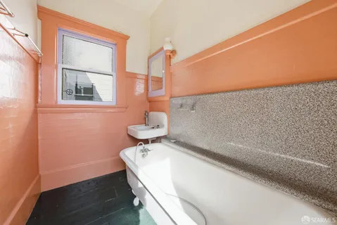a bathroom with a sink and a toilet