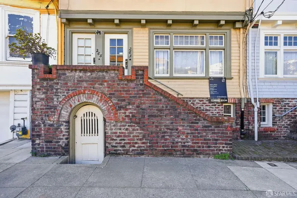 a front view of a house with a porch