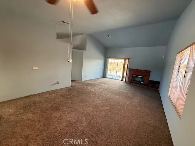 a view of empty room with windows