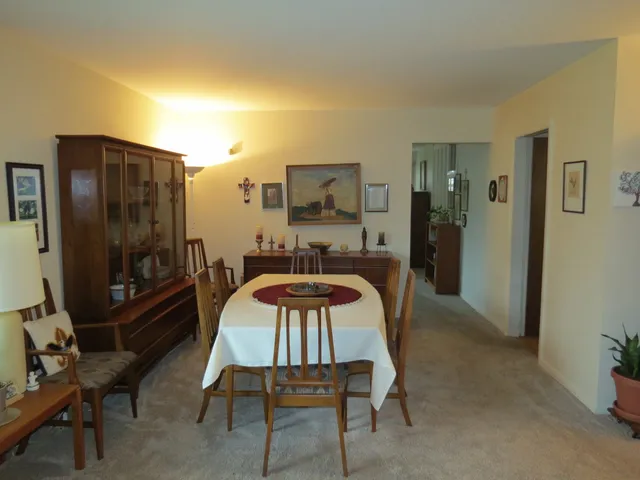 a view of a dining room with furniture