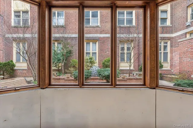 a view of a balcony with a large window