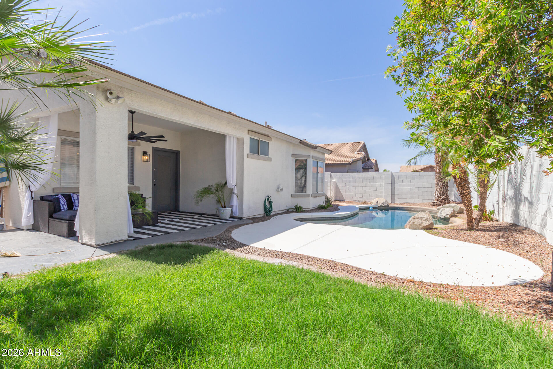 3674 South Joshua Tree Lane Gilbert, AZ 85297 - Photo 24 of 30 a view of a backyard of the house