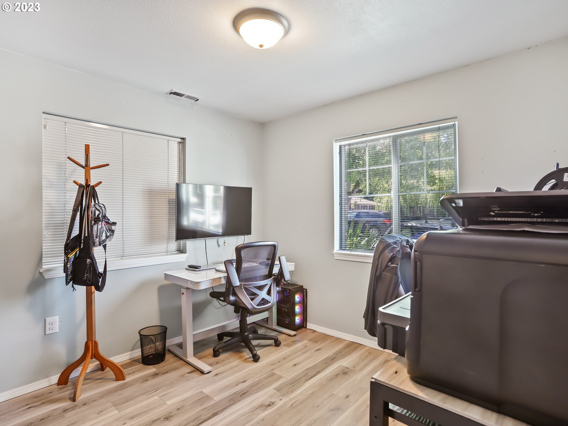18533 Southwest Deloris Lane Beaverton, OR 97007 - Photo 14 of 43 a work room with furniture and a window