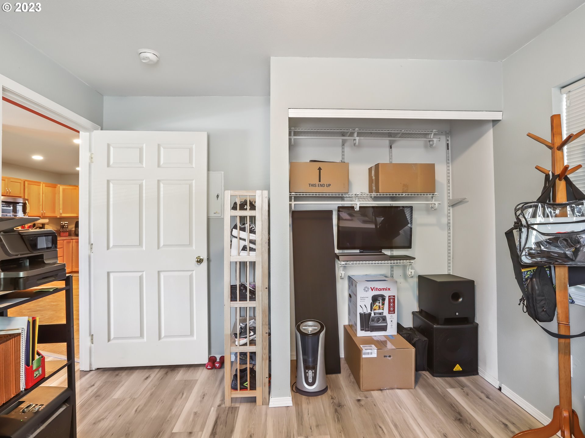 18533 Southwest Deloris Lane Beaverton, OR 97007 - Photo 16 of 43 a view of a workspace with furniture and wooden floor