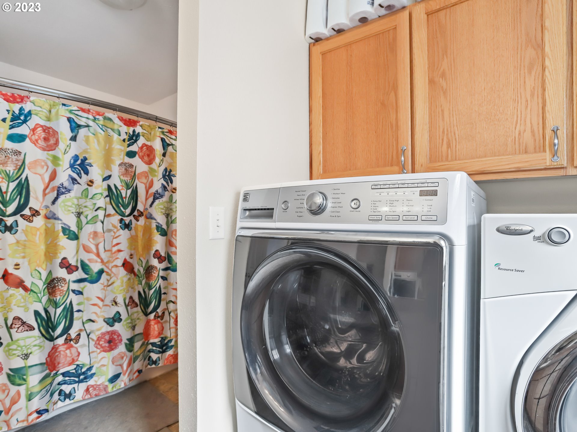 18533 Southwest Deloris Lane Beaverton, OR 97007 - Photo 19 of 43 a utility room with dryer and washer