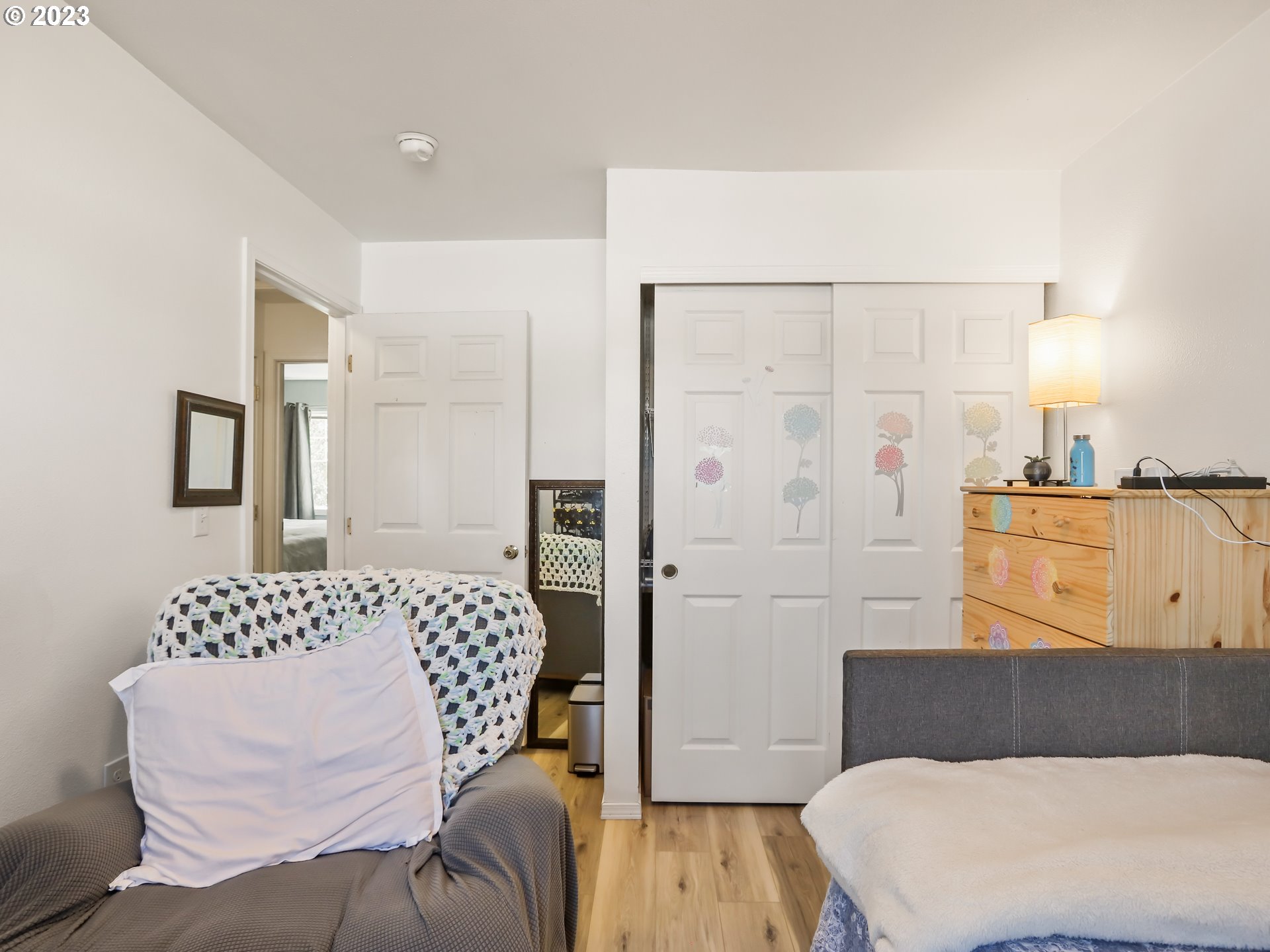 18533 Southwest Deloris Lane Beaverton, OR 97007 - Photo 22 of 43 a bedroom with a bed and a couch