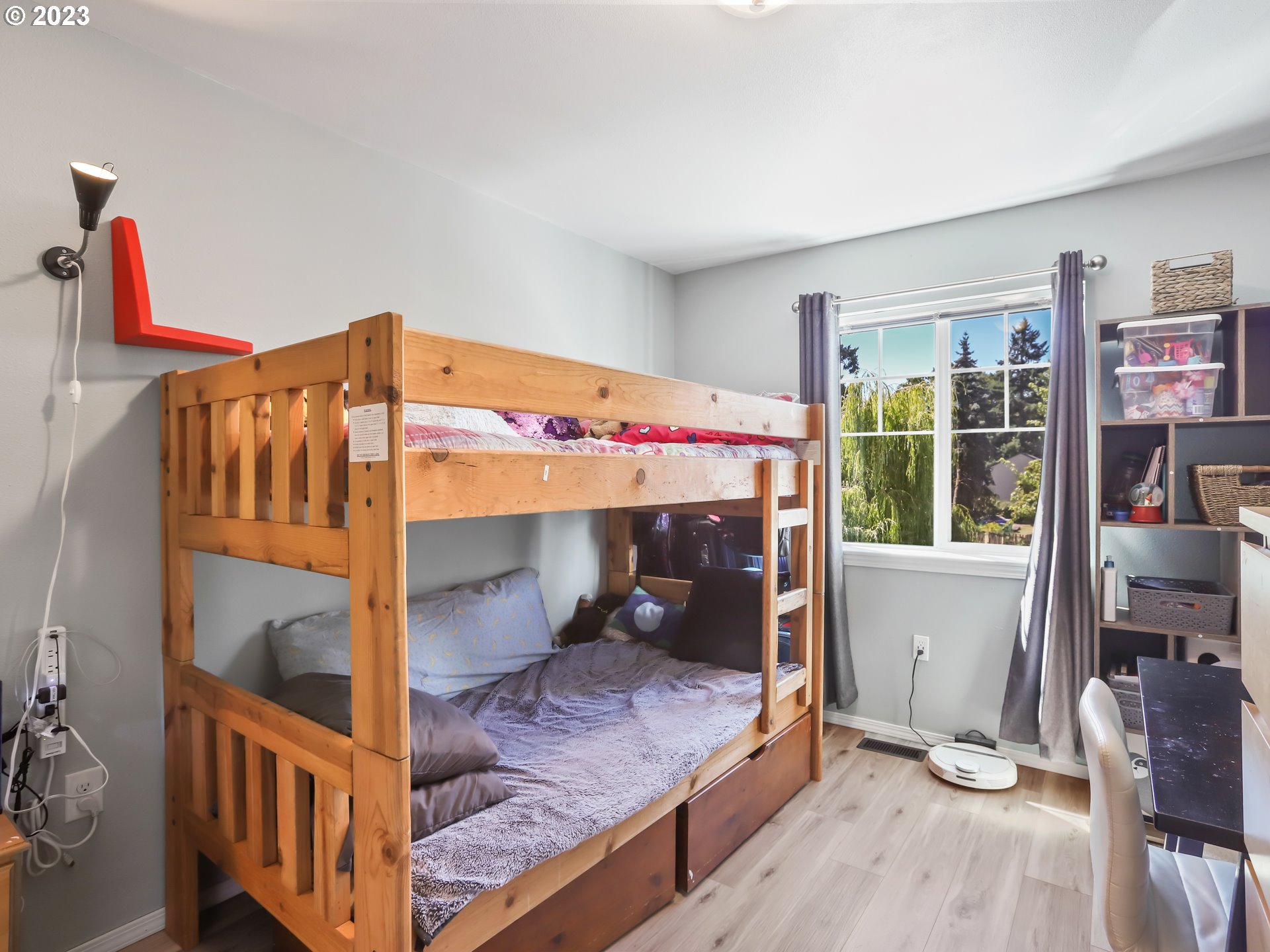18533 Southwest Deloris Lane Beaverton, OR 97007 - Photo 29 of 43 a bedroom with bunk bed and a window