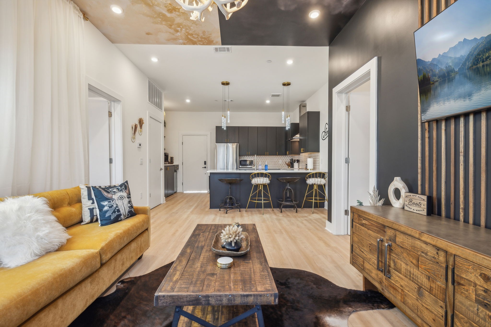 1310 Lischey Avenue, Unit 306 Nashville, TN 37207 - Photo 11 of 58 a living room with furniture kitchen view and a chandelier