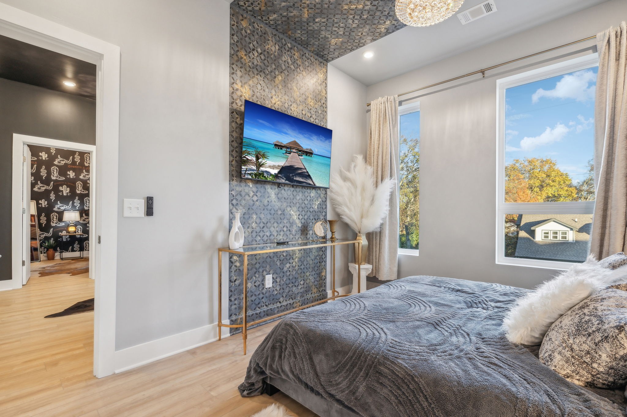 1310 Lischey Avenue, Unit 306 Nashville, TN 37207 - Photo 24 of 58 a bedroom with a bed and a flat screen tv