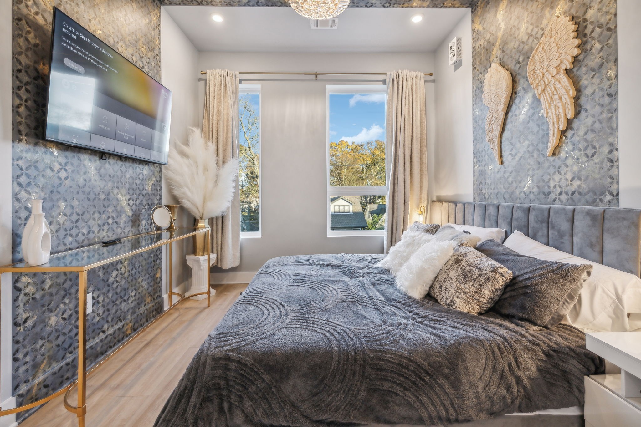 1310 Lischey Avenue, Unit 306 Nashville, TN 37207 - Photo 27 of 58 a bed sitting in a bedroom next to a window