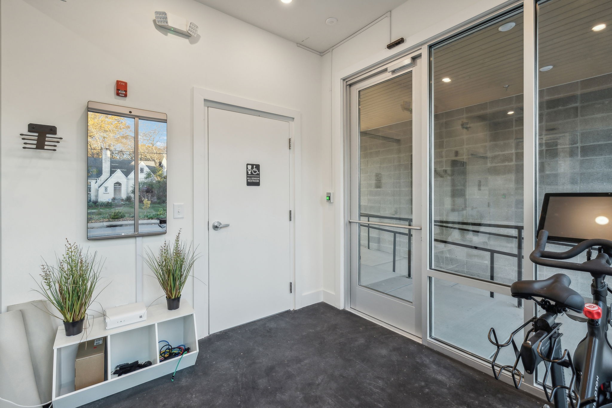 1310 Lischey Avenue, Unit 306 Nashville, TN 37207 - Photo 44 of 58 a living room with furniture and a potted plant