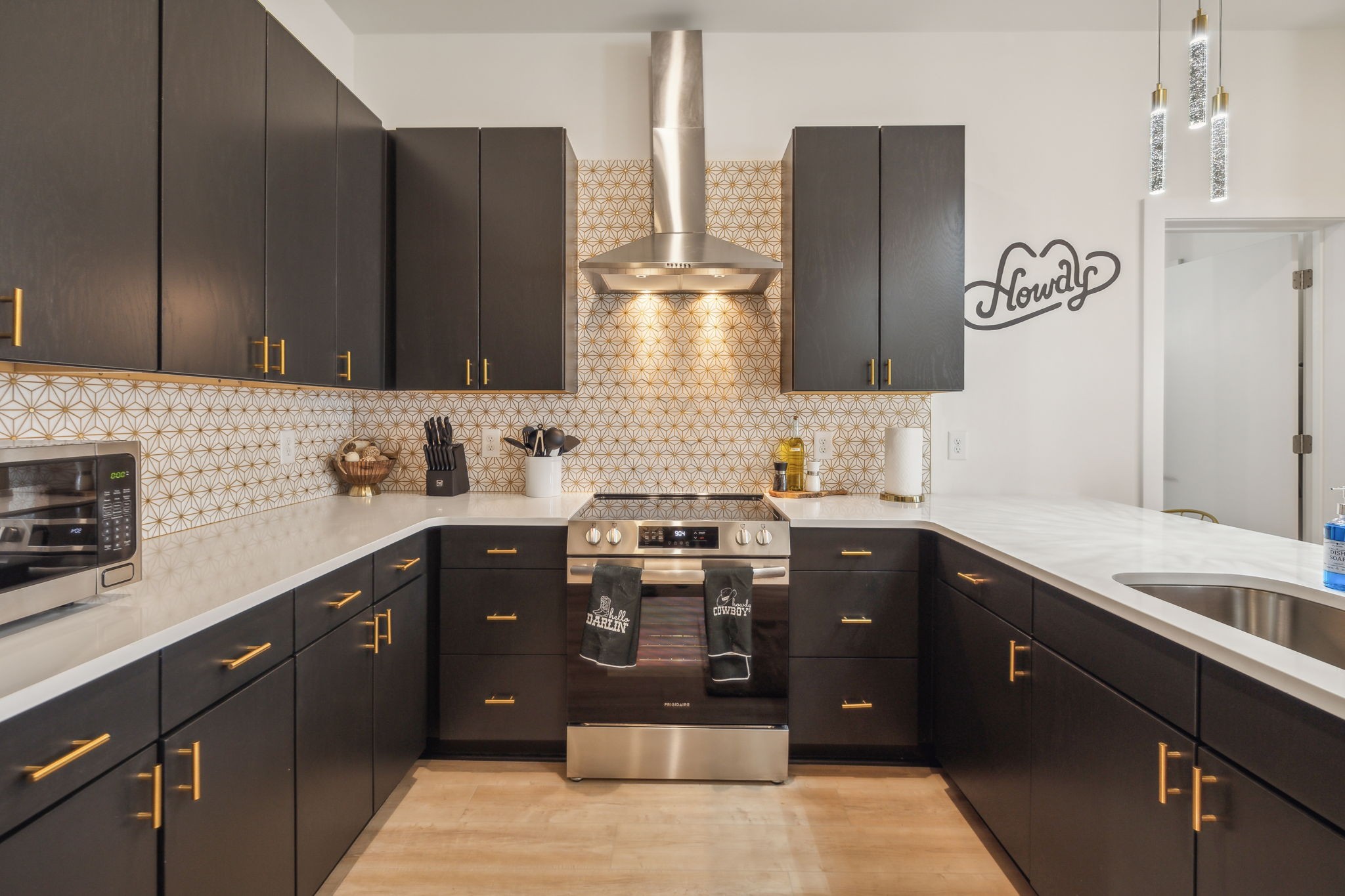 1310 Lischey Avenue, Unit 306 Nashville, TN 37207 - Photo 5 of 58 a kitchen with stainless steel appliances granite countertop a sink stove and refrigerator