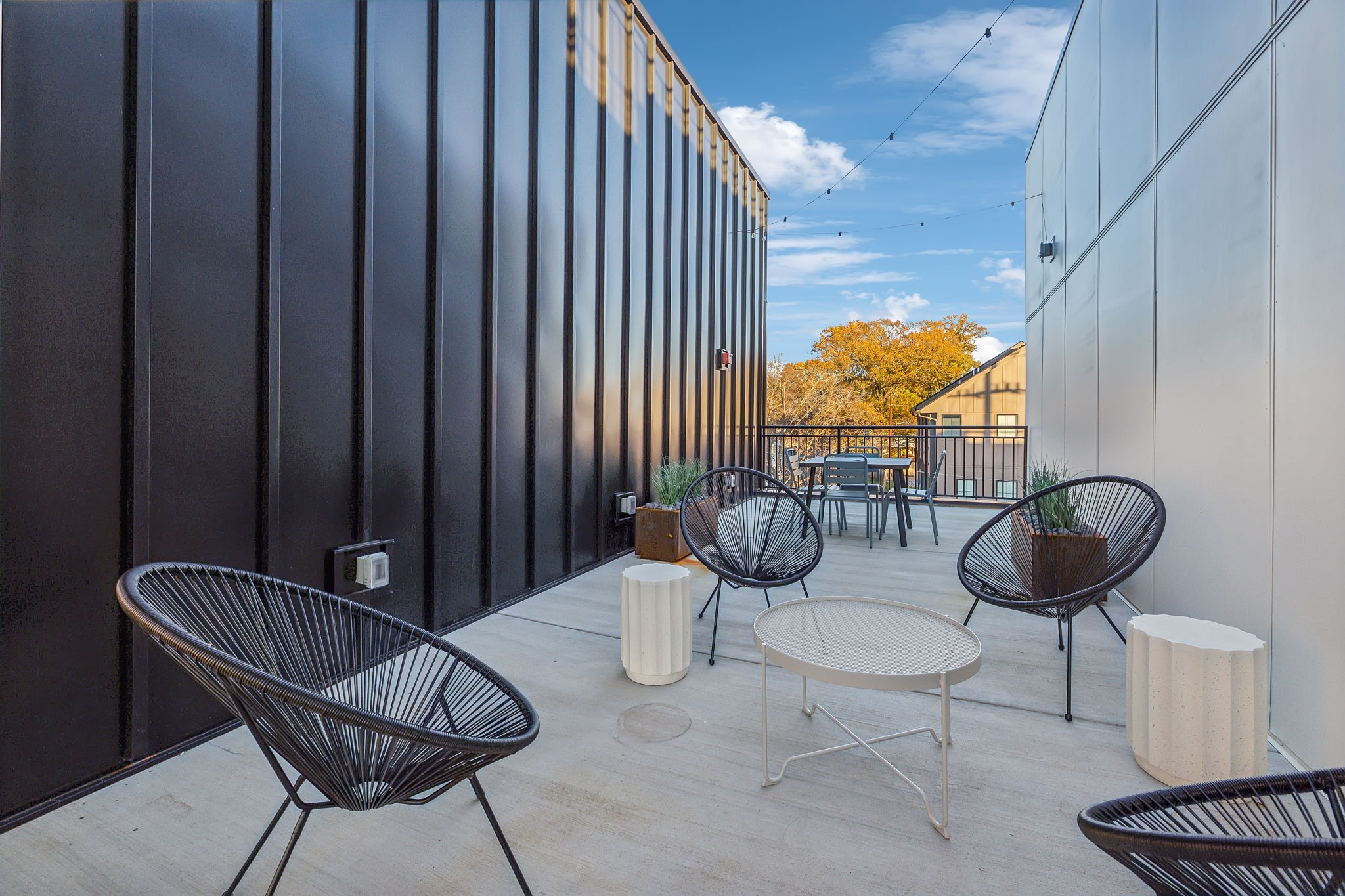 1310 Lischey Avenue, Unit 306 Nashville, TN 37207 - Photo 53 of 58 a view of a room with chairs and a chandelier
