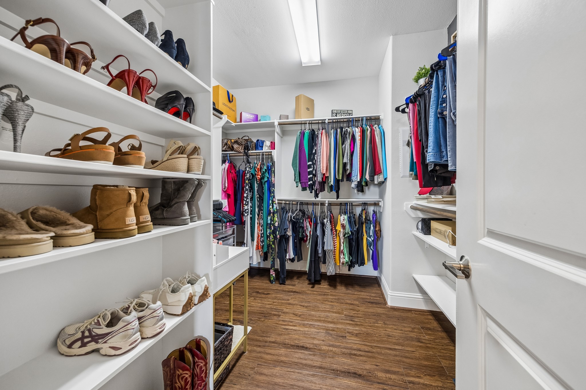 624 East 28th Street Houston, TX 77008 - Photo 25 of 34 a view of walk in closet with clothes and shoes
