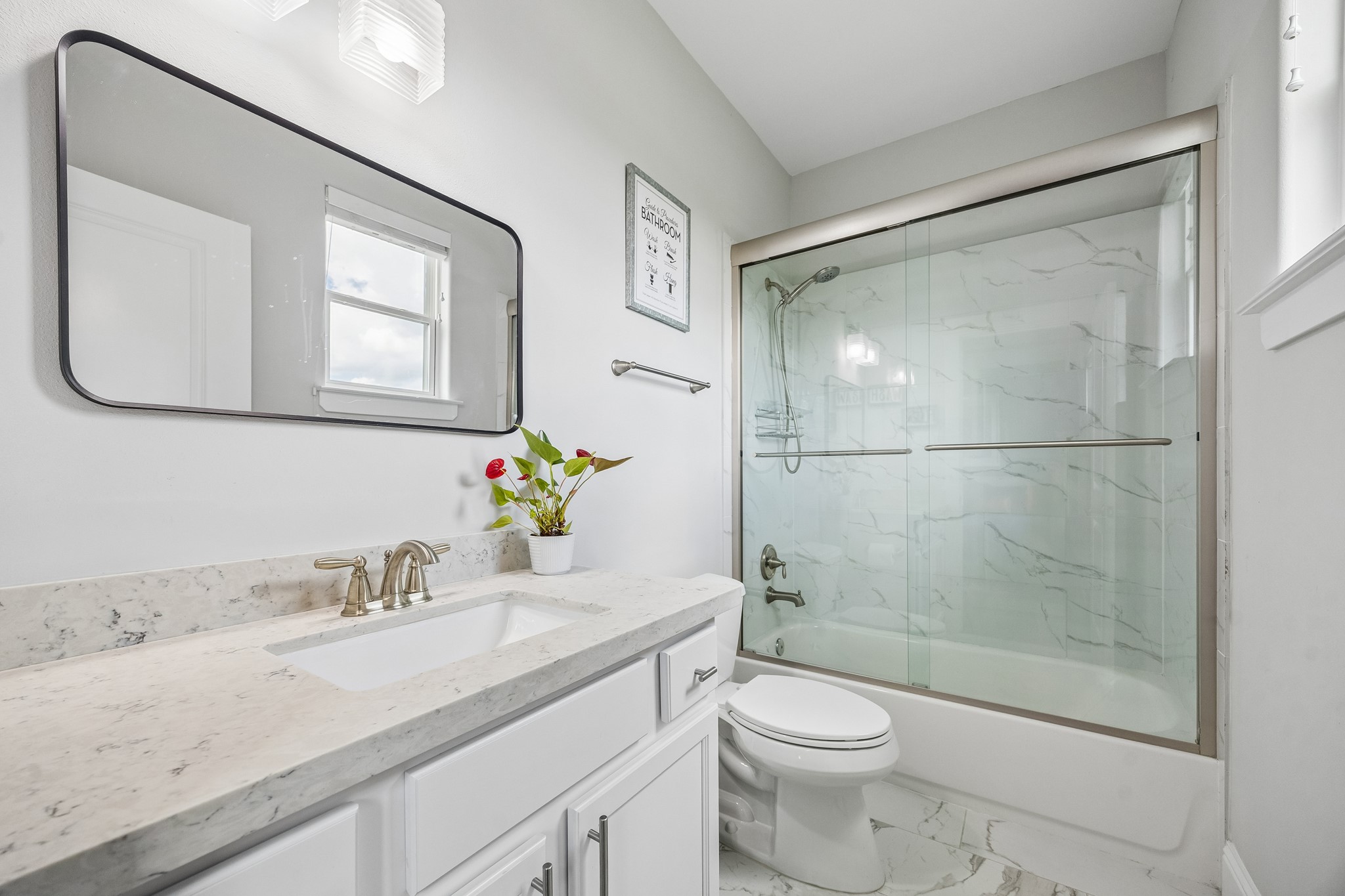 624 East 28th Street Houston, TX 77008 - Photo 27 of 34 a bathroom with a granite countertop sink toilet and shower